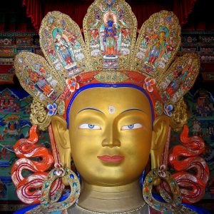 Maitreya Bodhisattva at the Thikse Monastery in Ladakh, India. Cropped source Wikimedia